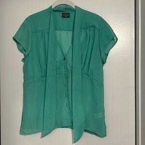Sheer green blouse. Rock Steady L